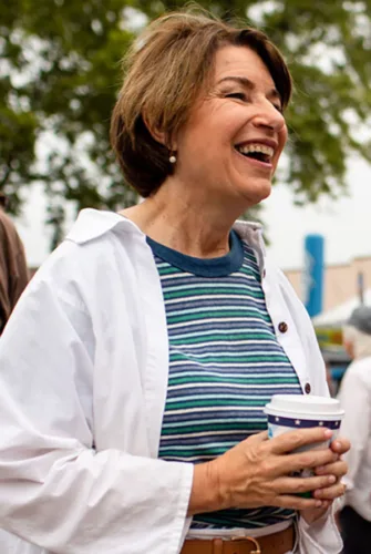 Klobuchar, Demuth pound pavement at state fair